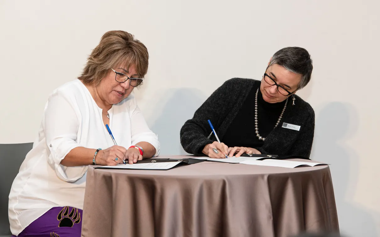 Transfer of property documents at the repatriation ceremony