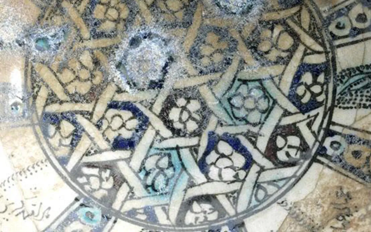 Detail of bowl with geometric interlace pattern.