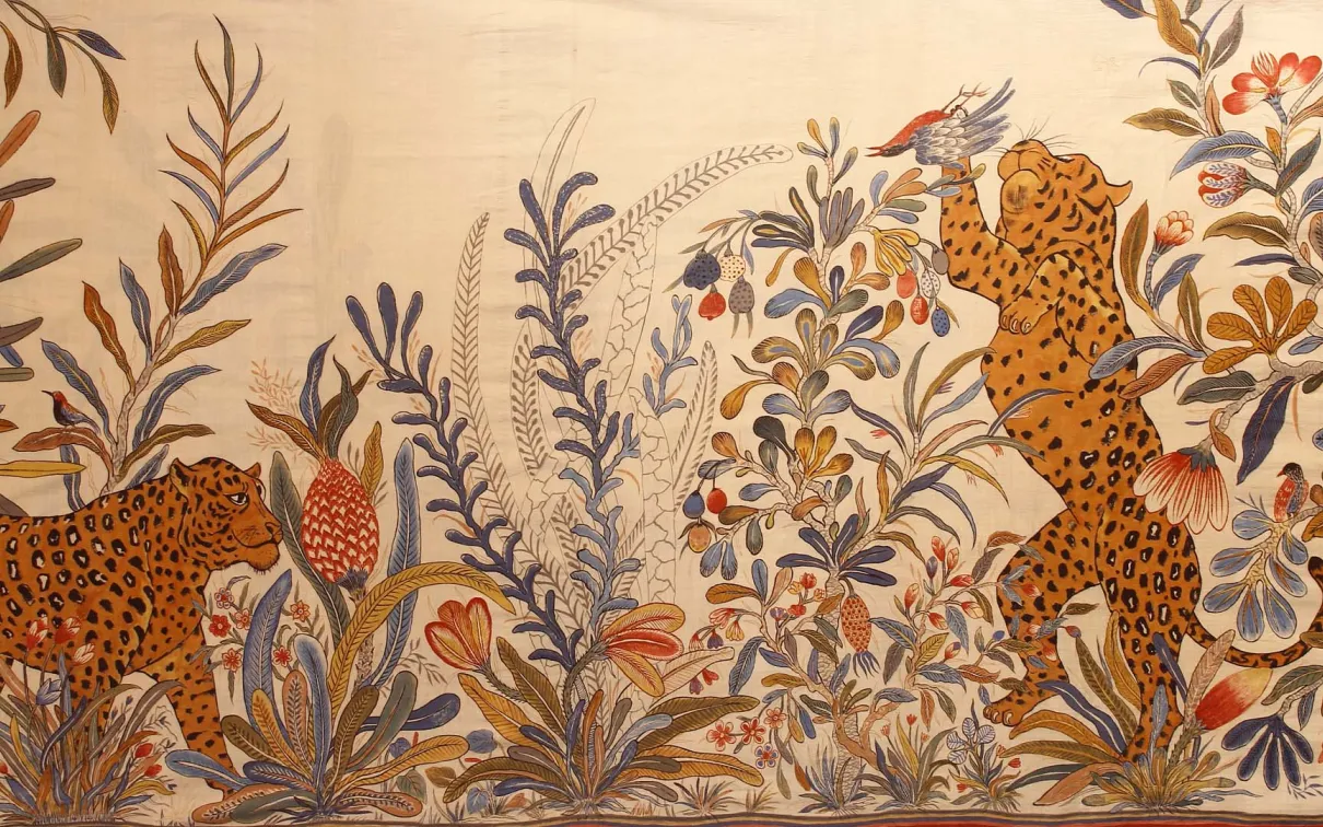 Handspun and handwoven sari with tigers and plants.
