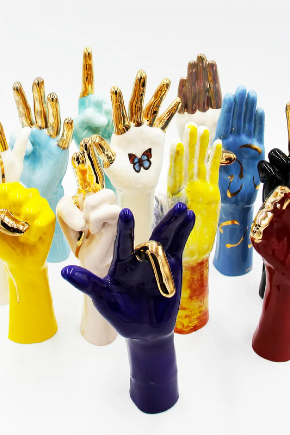 Brightly coloured ceramic hand shapes 