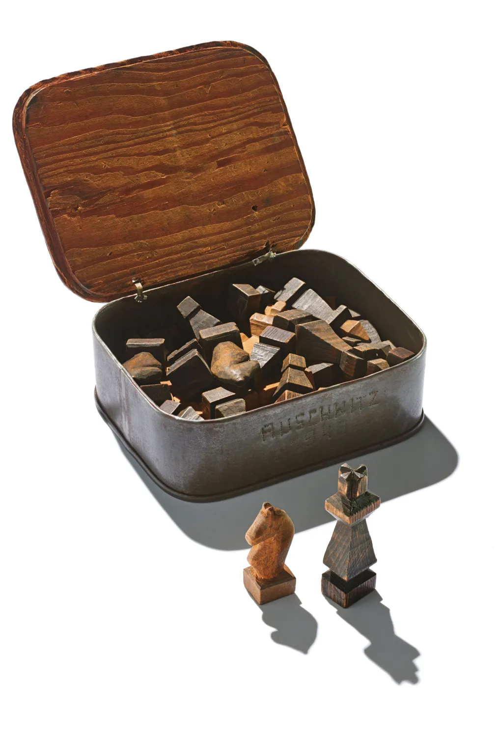 Prisoner-made chess set with storage box made out of a sardine tin.