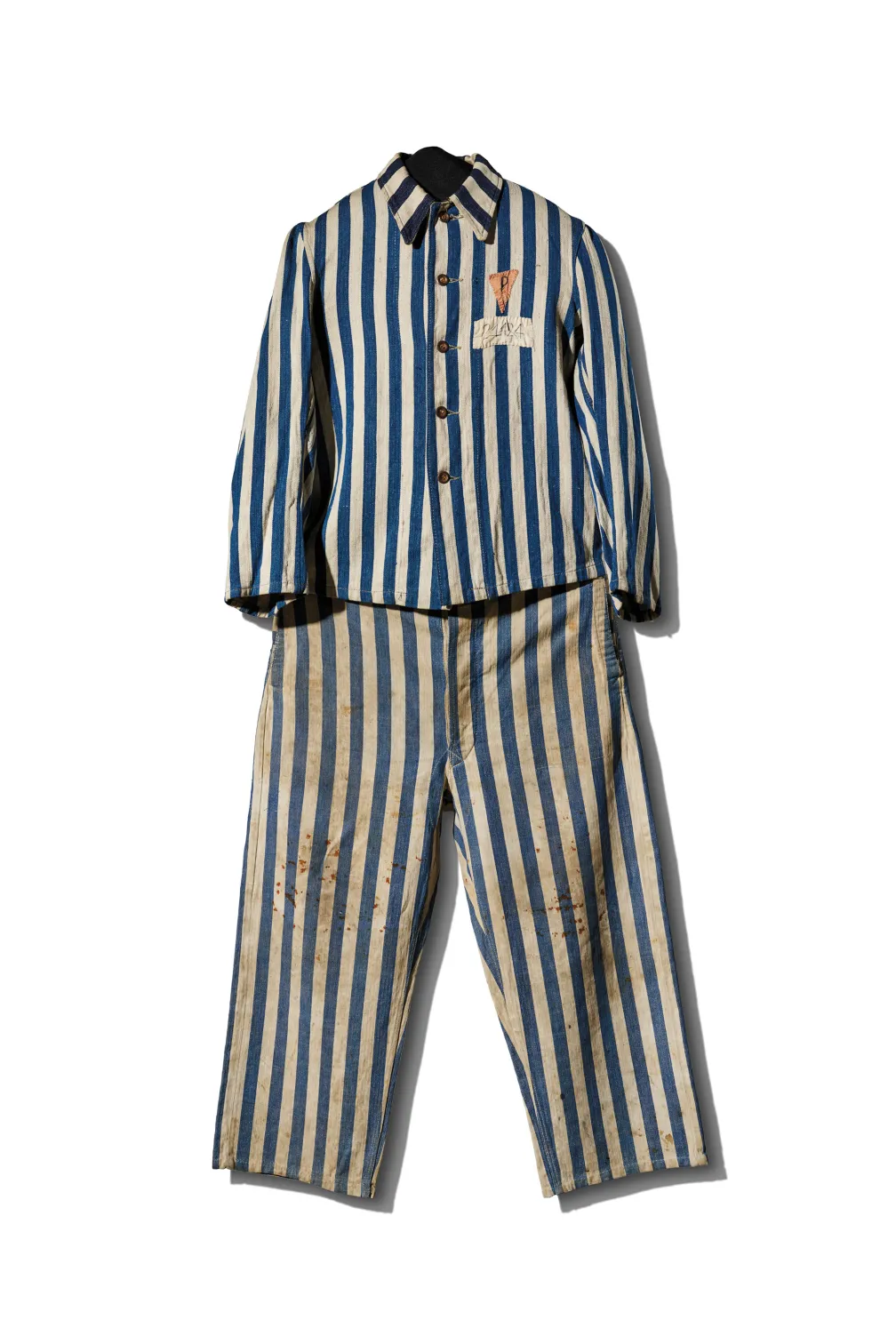 Blue and white striped uniform worn by Marian Kostuch, held as a Polish political prisoner (1940–44)