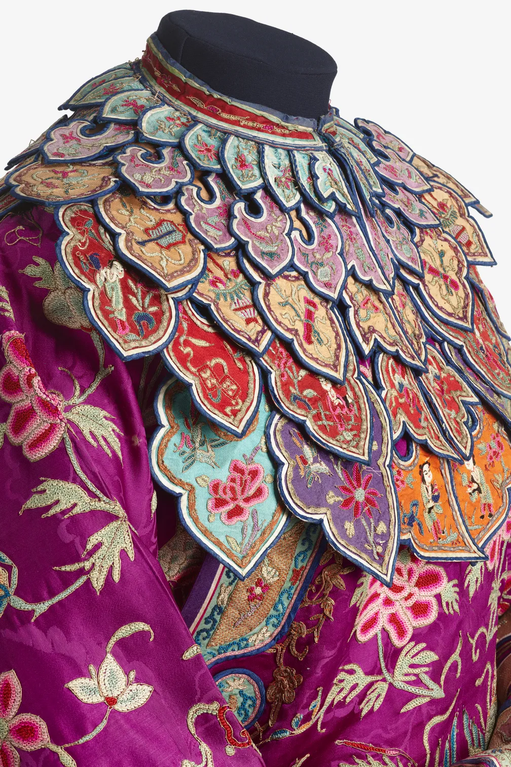 Closeup of an embroidered silk ensemble