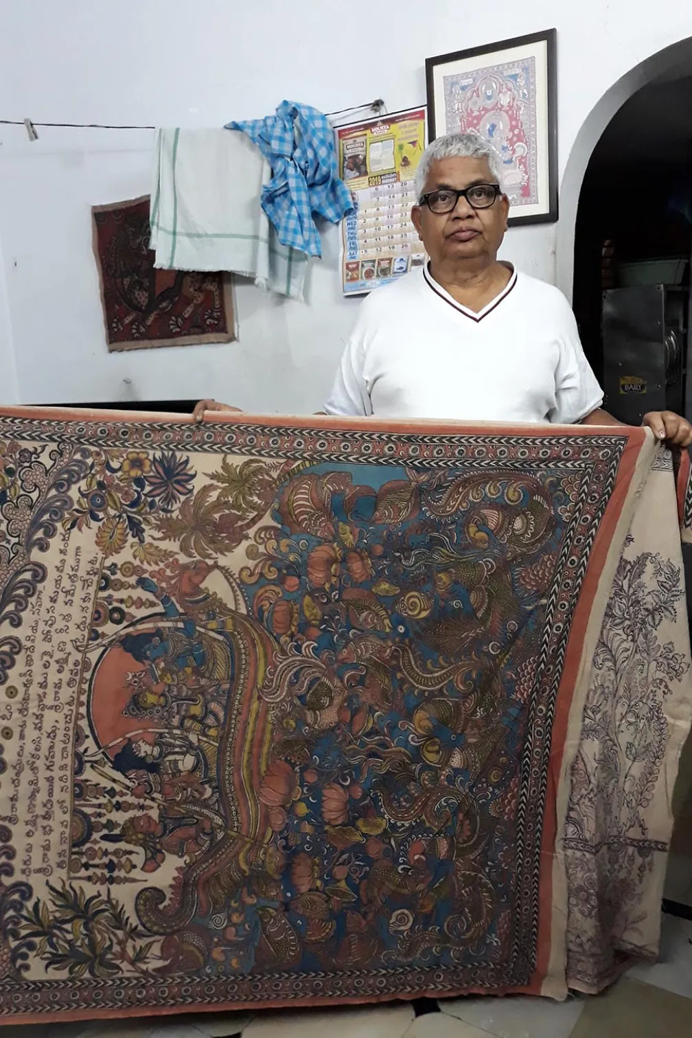 Man holding a printed textile