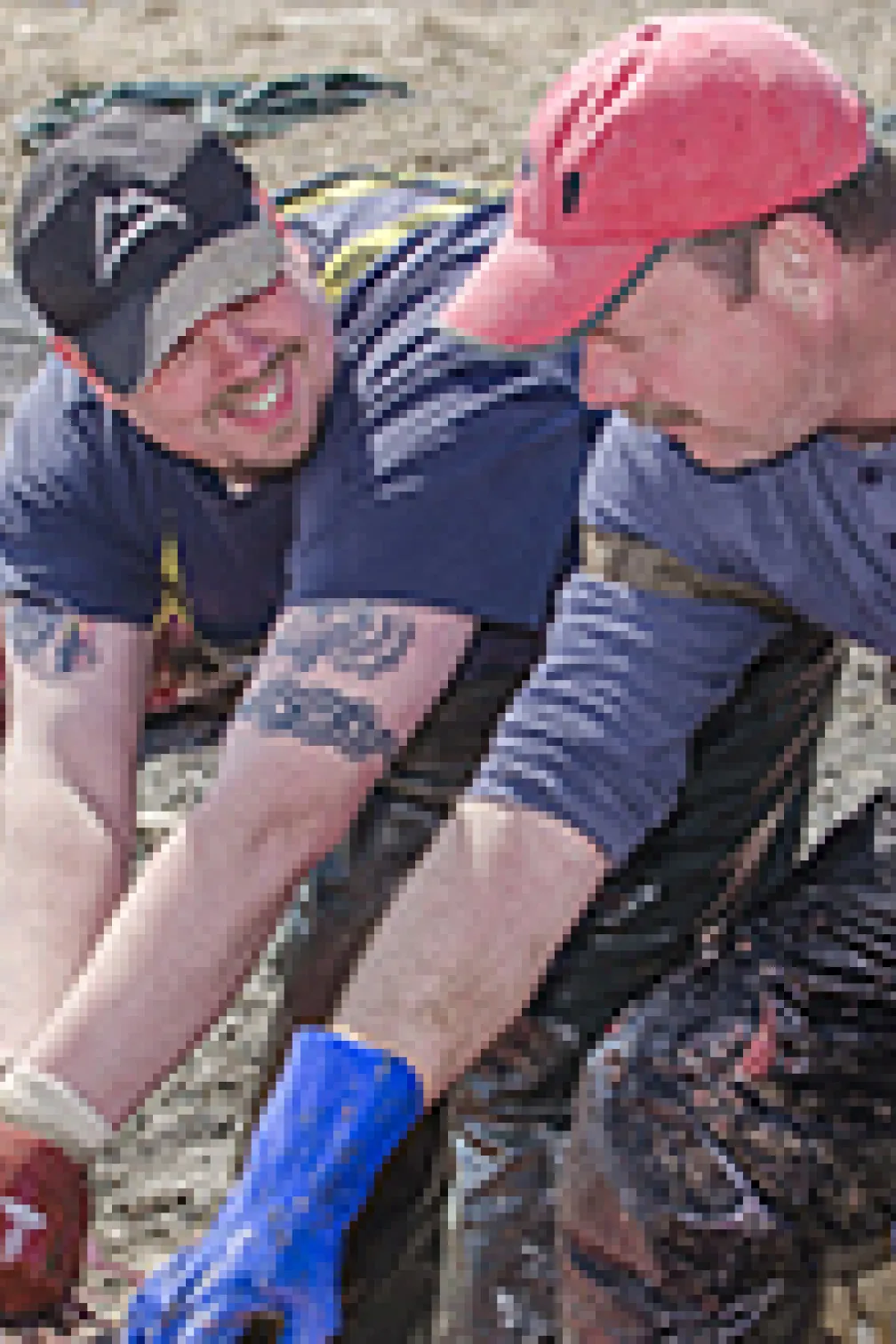 A boat next to the blue whale carcass
