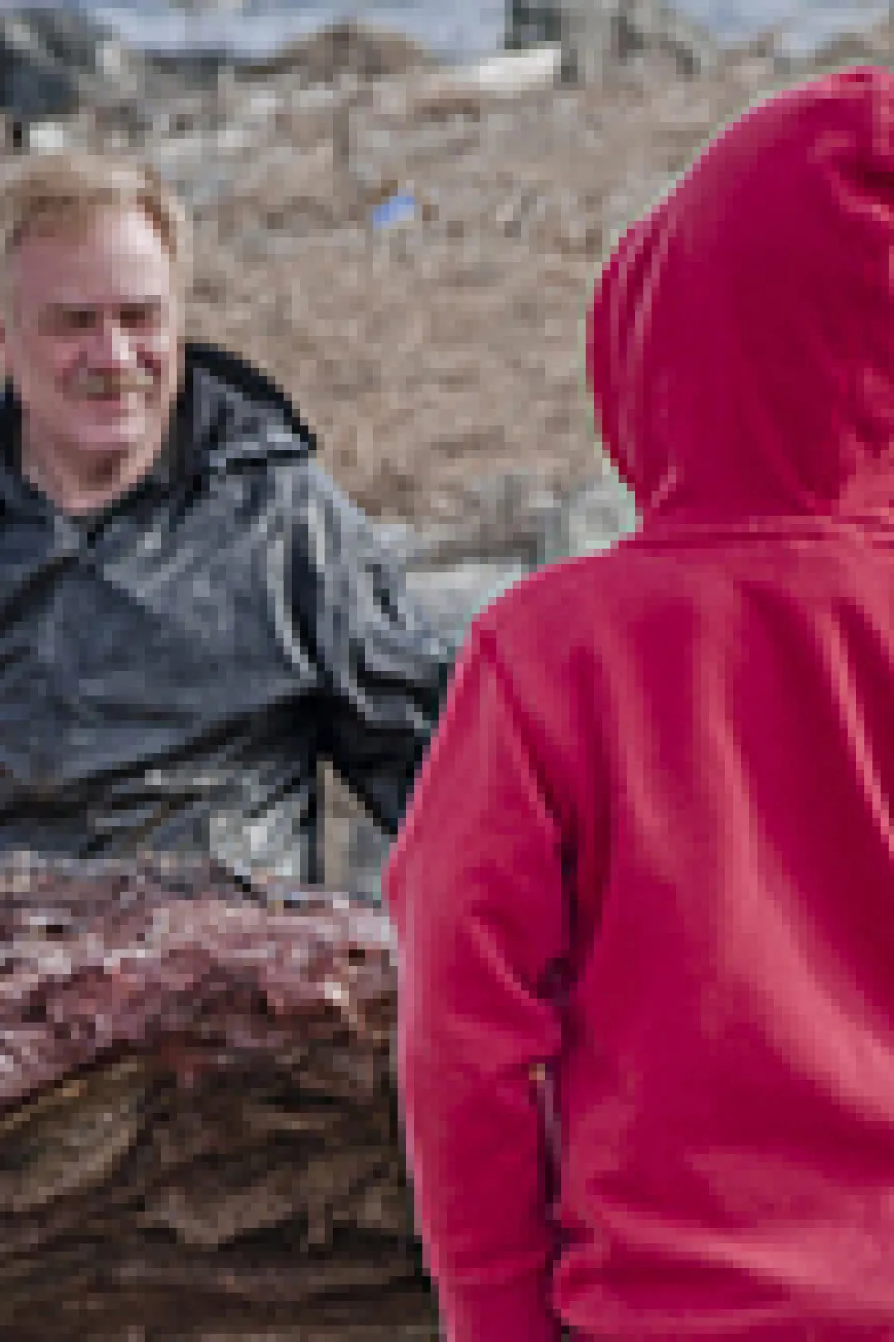 Boat pulling the blue whale carcass
