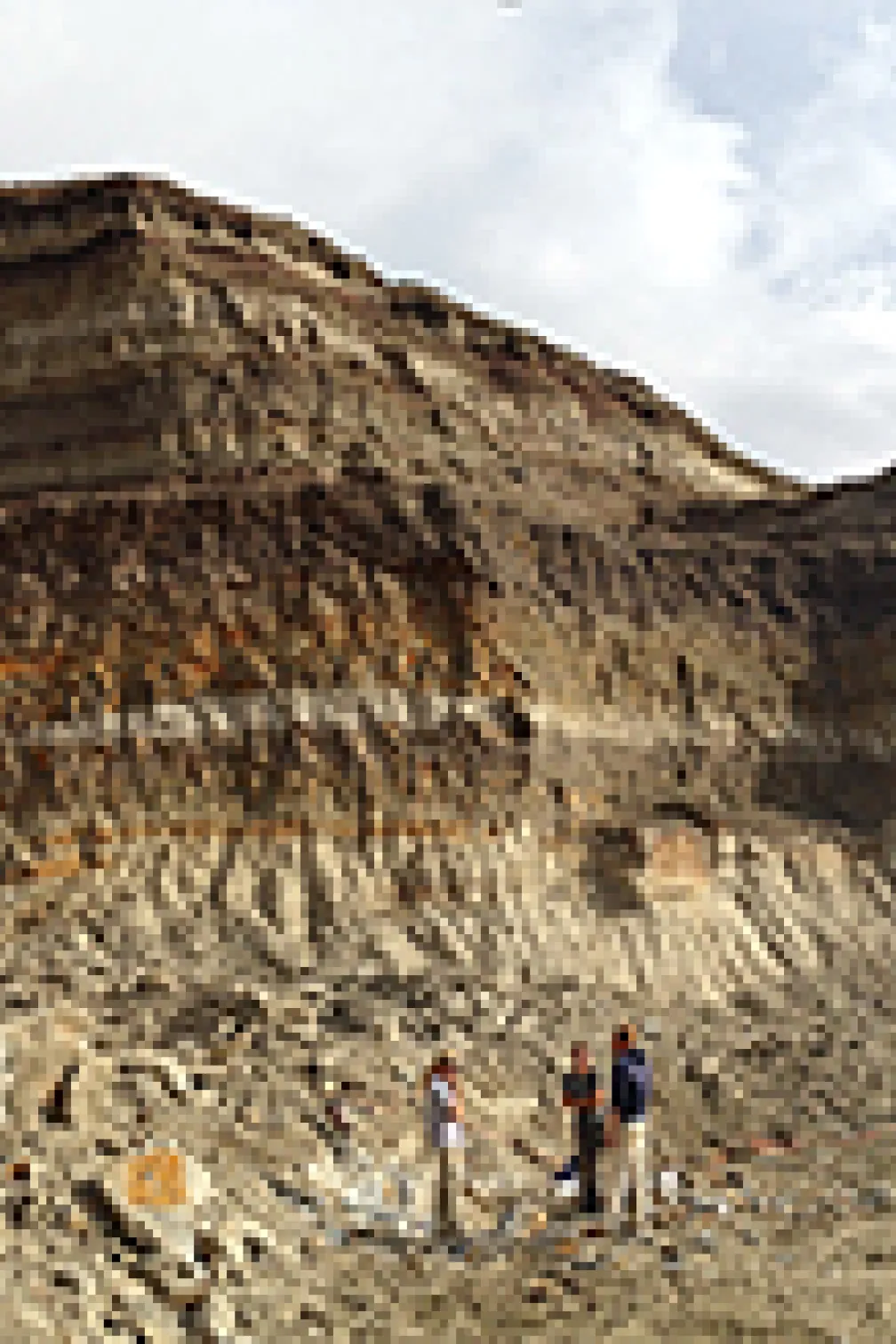Photo of people standing in a quarry
