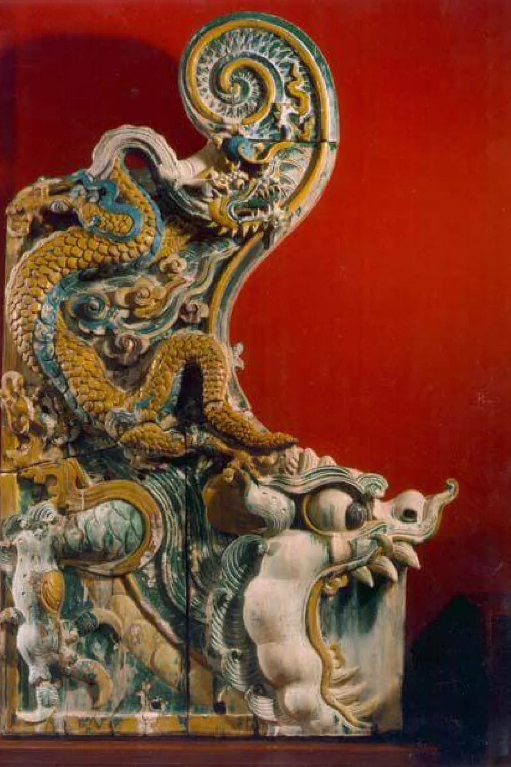Roof ridge finial of a dragon, moulded earthenware with glaze.