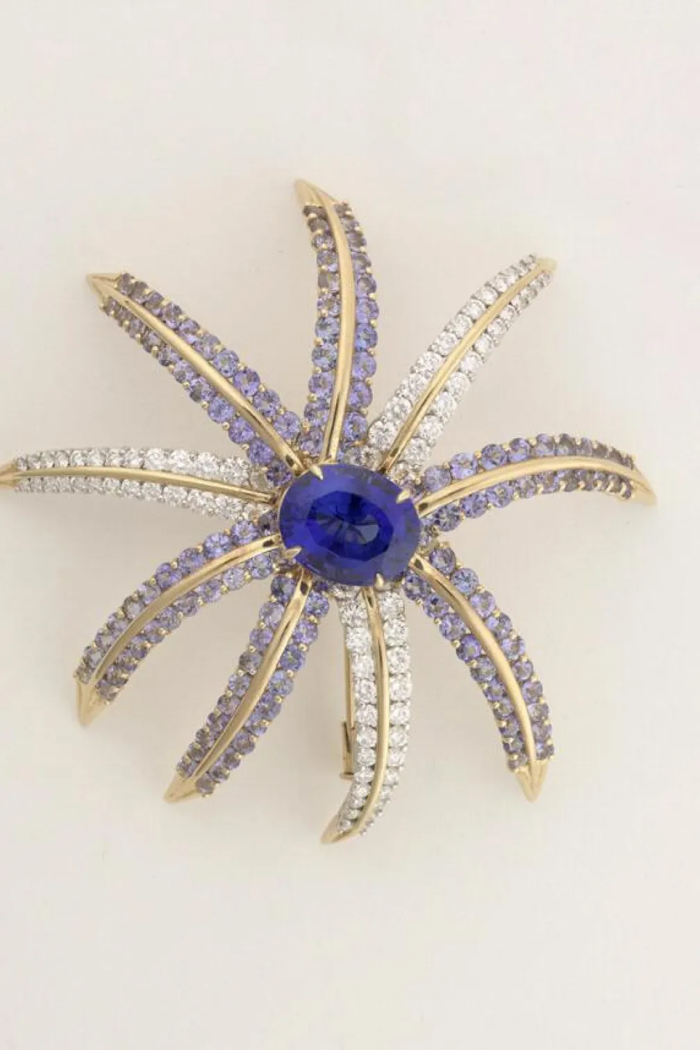 'Fireworks" tanzanite and diamond brooch.
