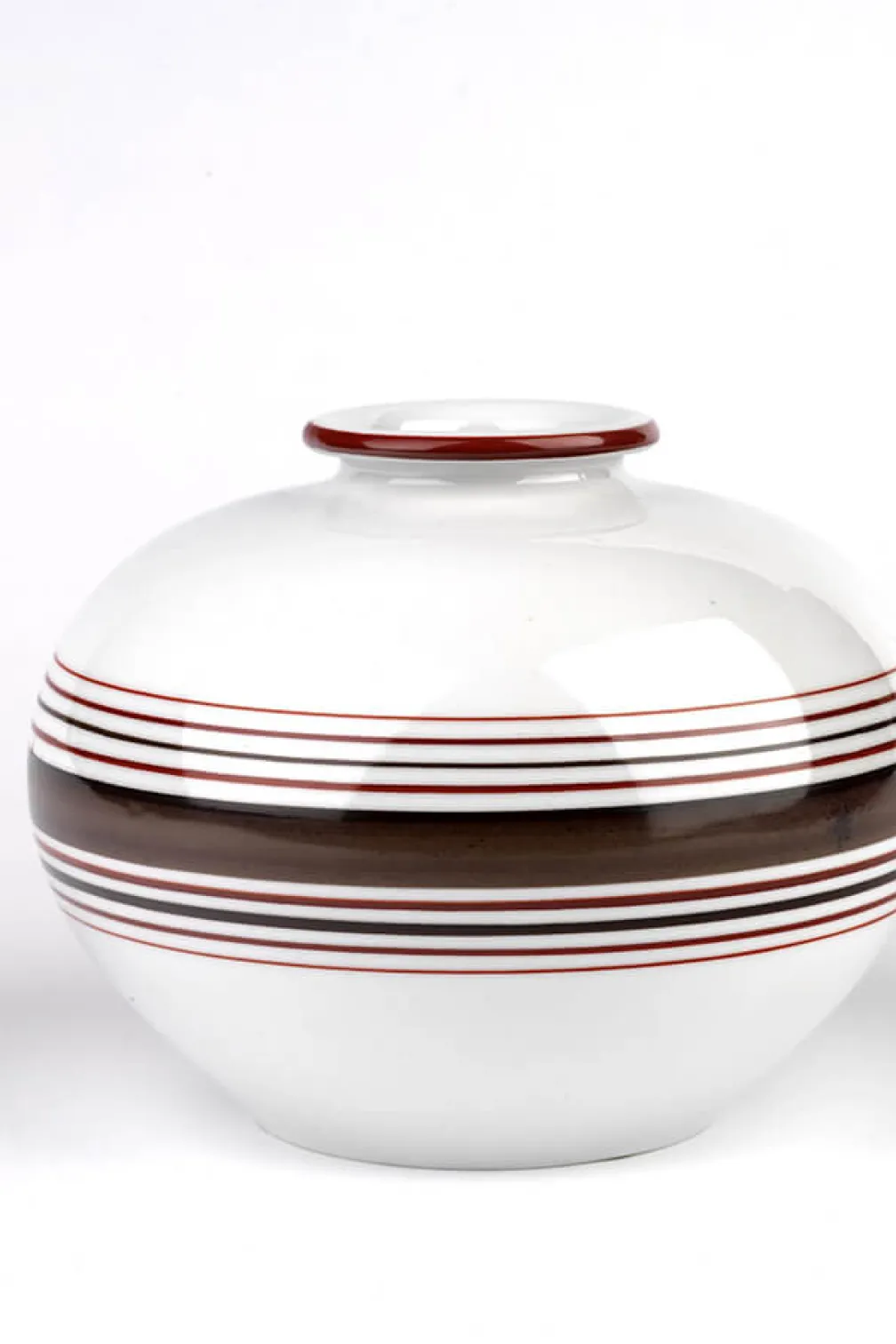 Hard paste porcelain vase, white with brown stripes.