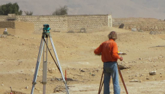 Dr. Kemp at an archaeology site in the desert