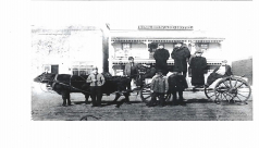 image of workers on a cart