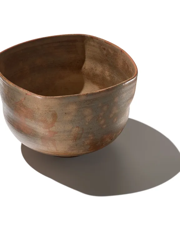 Rounded square tea bowl with flowing glaze, Edo period, late 17th century, stoneware, 8.1 × 13.2 cm