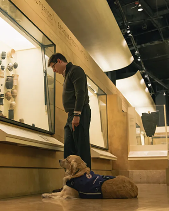 A person with service dog enjoy ROM
