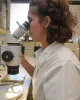 Antonia Guidotti at microscope
