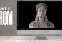 A computer screen displays a Greek statue of a woman with red hair. Text reads Virtual ROM.