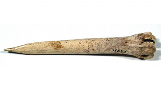 Carved bone point or awl.