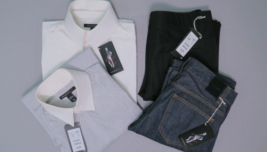 Selection of men's shirts and pants. Karl Lagerfeld (Hamburg, Germany, 1933 - 2019),  H&M capsule collection. Gift of Joseph Wong. 2021.115.10.1- .4  