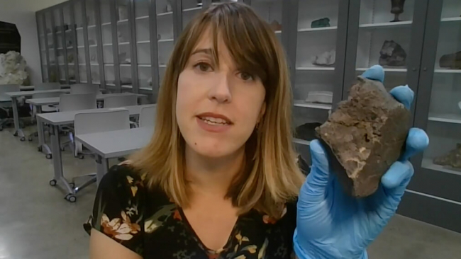 Veronica DiCecco holding asteroid.