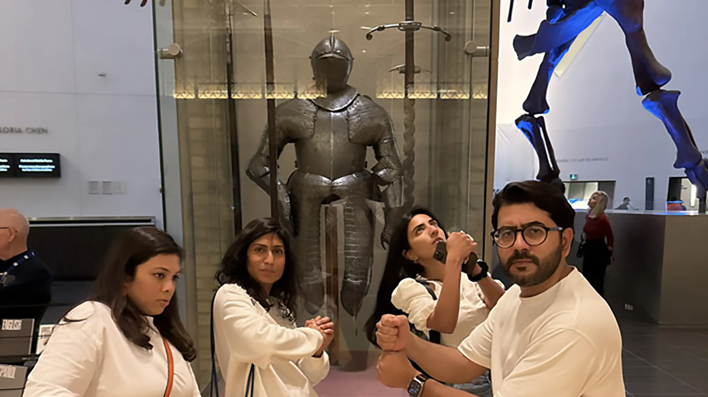 4 ROM guests posing with imaginary swords