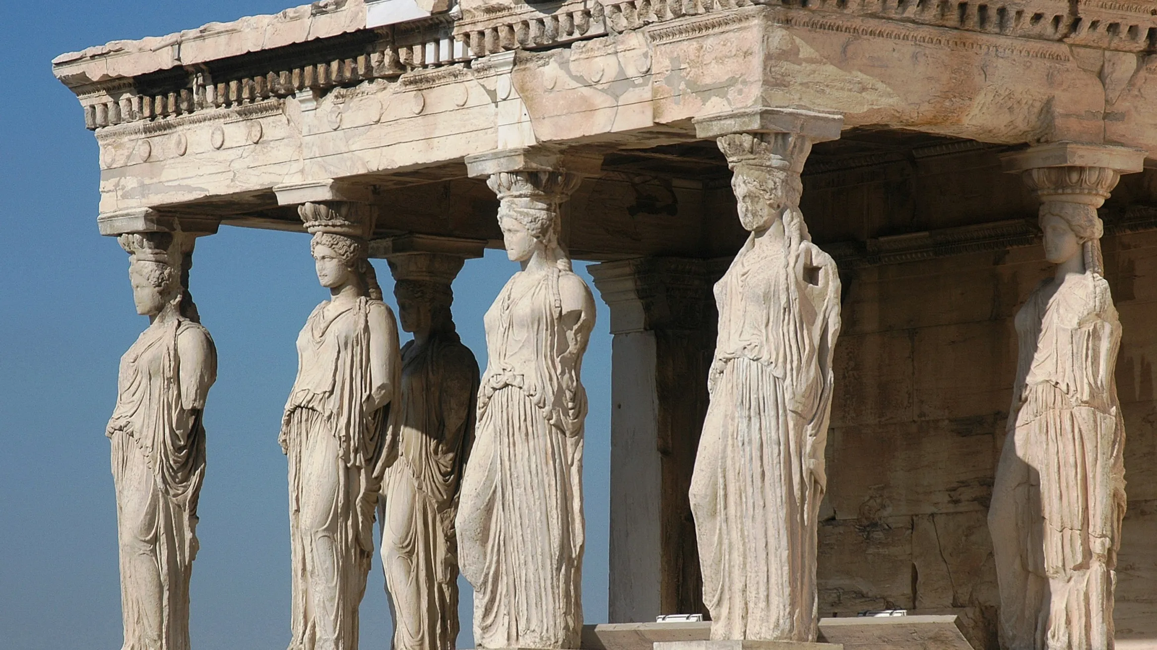 Porch of the Caryatids at the Erechtheum, Acropolis, Athens, Greece. © Harrieta171, Wikimedia Commons, 2006.