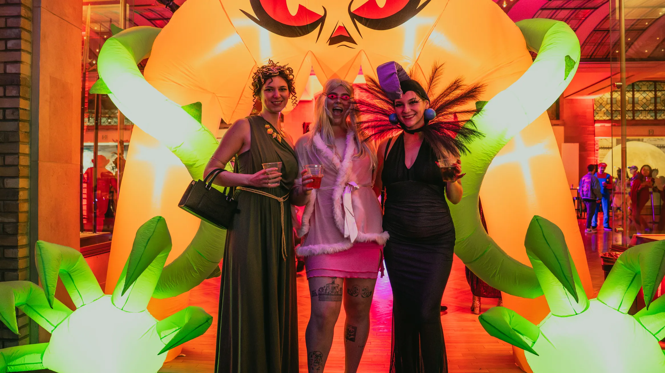 image of 3 women in front of inflatable at RAD 