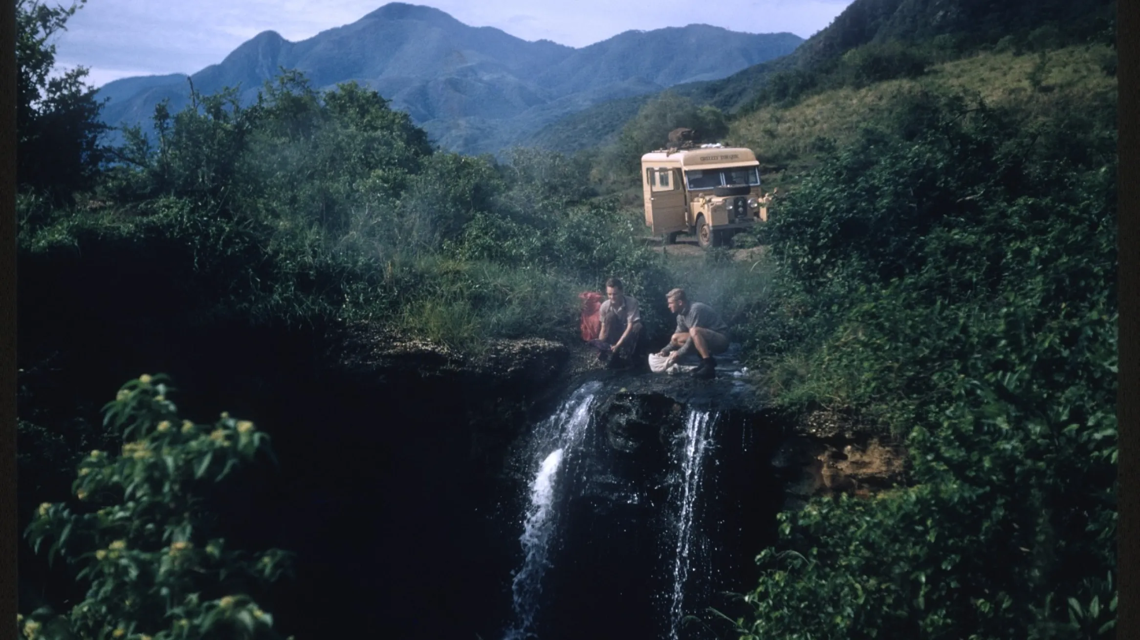 Filmmaker Bristol Foster and Artist Robert Bateman by Waterfall.